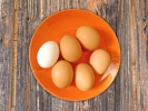 Eggs on wooden background