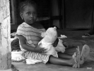 little girl playing with her doll