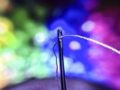Stiching needle with thread