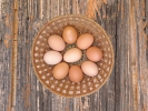 Eggs on wooden background