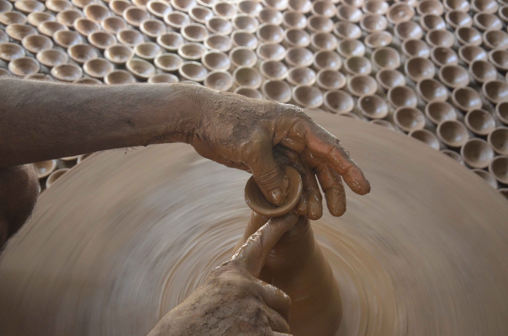 earthen lamp (Diya) making in Bhopal, potter, earthen lamp, Diya, Bhopal, India, Madhya Pradesh, 
