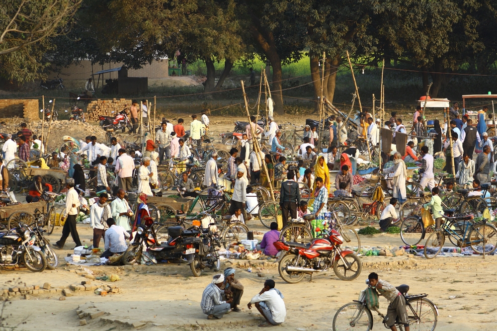 A vllage market, market, village, haat, people, motocycles, cycles, rickshw, sellers, buyers