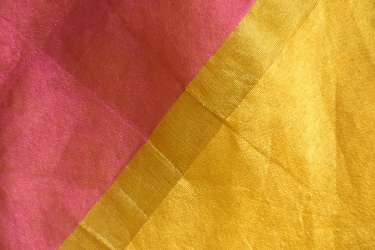 Close up of an Golden & Pink Saree